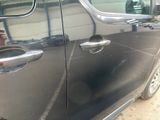 a close up of a car door handle and door handle