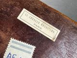 a piece of wood that has a stamp on it
