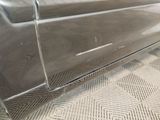 a close up of a car door with the door handle missing