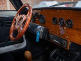 a steering wheel and dashboard of an old car