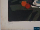 a picture of a painting of an orange on a table