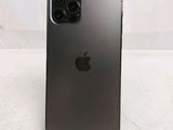 a close up of the back of a black iphone 11