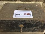a stone box with a lot ' n 248 sign on it