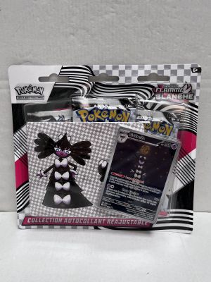a bag of pokemon trading cards with a picture of a girl in a dress