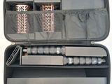 a case that has a knife, brush, and other items in it
