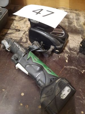 a cordless drill and a cordless cordless drill on the floor