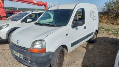 a white van that is parked in a lot