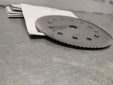 a close up of a piece of metal on a table