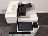 a white printer sitting on top of a black and white printer