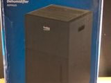 boxed box for a desktop computer sitting on a wooden table