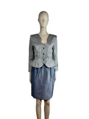 grey jacket and skirt on a mannequin mannequin mannequin mannequin mannequin mannequin mannequin mannequin manne
