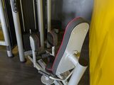 a gym equipment that is in the corner of the room