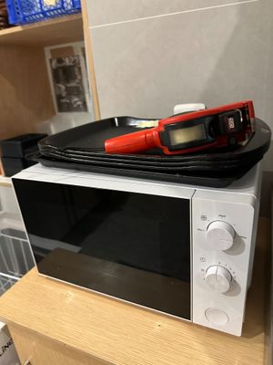 a microwave that is sitting on top of a counter