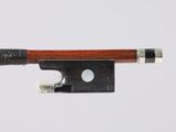 violin bow made of wood and metal on a white background
