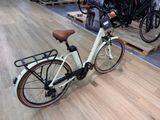 a bike that is sitting on the floor in a store