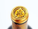 a close up of a bottle of wine with a label on it