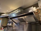 an image of a kitchen with stainless steel appliances