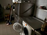 a washer and dryer in a small room