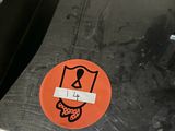 a sticker with a picture of a cat on it