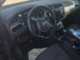 a car that has a steering wheel and a dash board in it