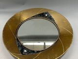 miroir plaqué laiton orné d'un motif en noir et blanc