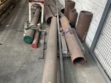 many pipes that are lined up on the floor