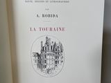 the front cover of a book with a drawing of a castle on it