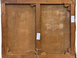 an old wooden box with a label on it