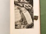 an open book with a drawing of a man on a bridge