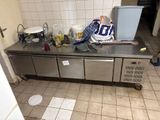 an image of a kitchen with a lot of clutter on the counter
