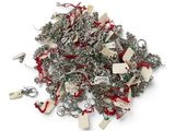 pile of silver and red christmas ornaments on a white background
