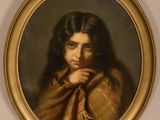 portrait of a young woman in a brown shawl by a gold frame