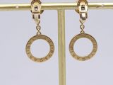 a pair of gold earrings with the word ' love ' on them
