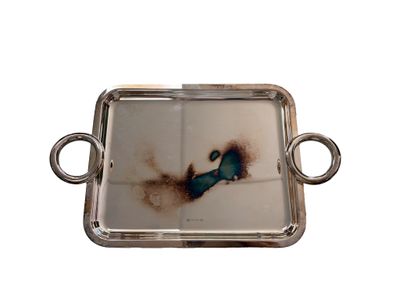 a silver tray with a picture of a bird on it
