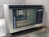 a microwave sitting on a counter in a kitchen