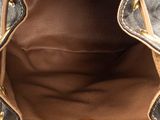 a close up of a purse with a zipper on the inside
