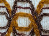 a picture of a close up of a piece of embroidery