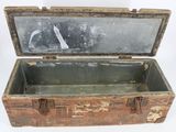 an old wooden box with a mirror inside of it