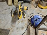 a picture of a room that has a lot of tools on the floor