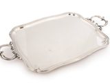 a silver tray with handles and handles on a white background