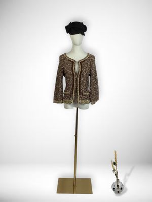 an image of a mannequin with a hat and jacket on a stand