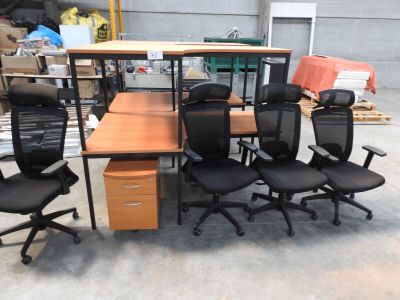 a lot of office chairs and a desk in a warehouse