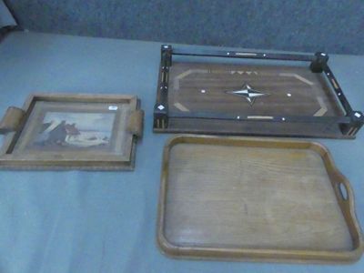 two trays that are sitting on a table