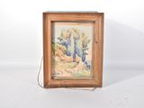 une image représentant un tableau dans un cadre en bois posé sur une surface blanche