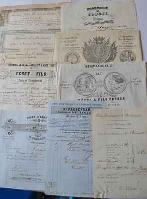 several old documents are stacked on top of each other