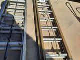 two ladders that are sitting next to each other