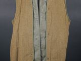 an image of a brown vest on a mannequin stand