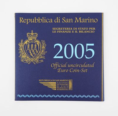 the book is blue and gold with a picture of a crown on it