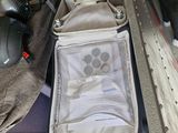 a bag that is sitting in the back of a car