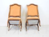 pair of antique chairs with upholstered back and upholstered seat